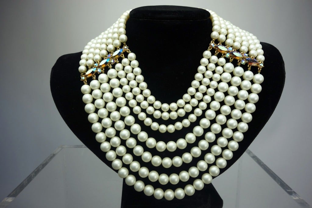 Schiaparelli seven-strand pearl necklace with borealis clasp and detail. Stamped 