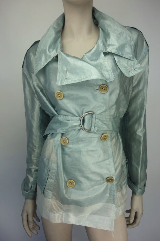 Dries Van Noten silk-blend double breasted belted jacket with two front pockets.

Bust and Waist Measurements are 46