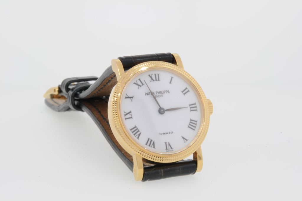 Patek Philippe 18k yellow gold lady's Calatrava wristwatch, retailed by Tiffany & Co.

610-71376
