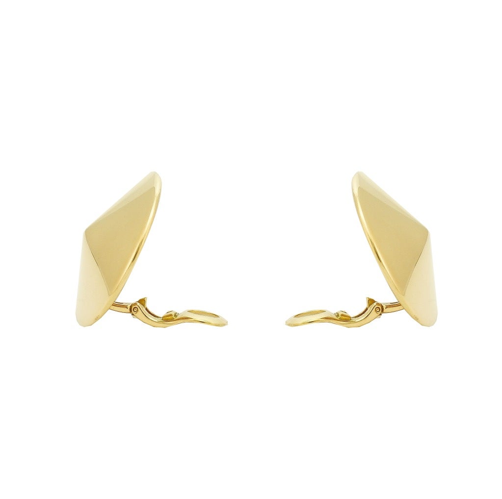 Featuring a pair of 18k gold disc earrings by Van Cleef & Arpels. Marked VCA 750 BL 69612.