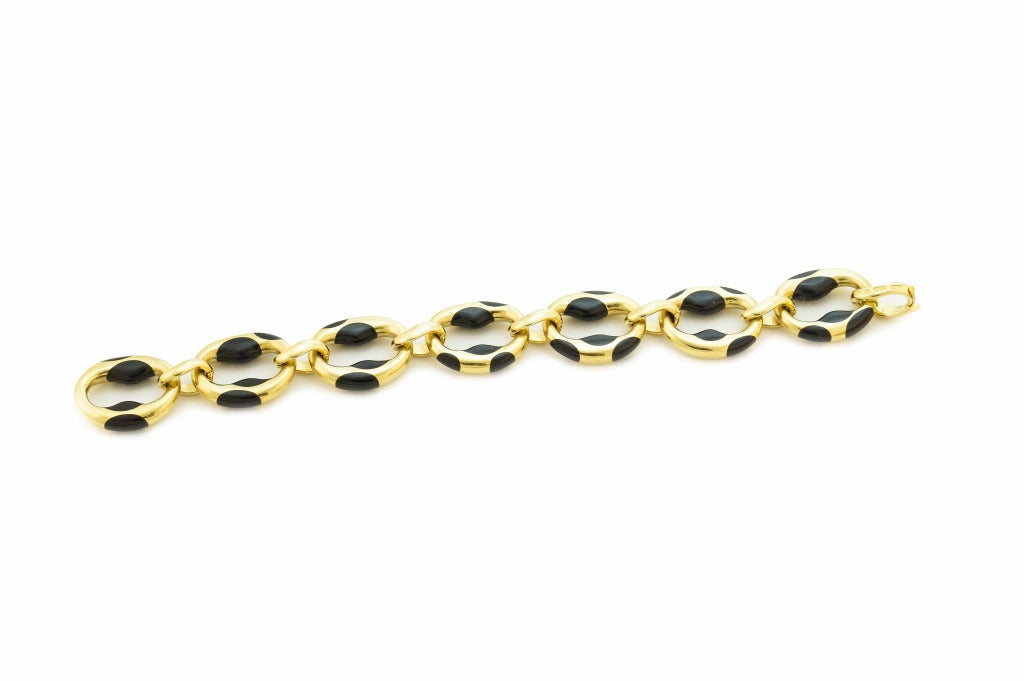 Featuring an 18k gold oval links with onyx inlaid bracelet by Angela Cummings for Tiffany & Co. Signed Tiffany & Co.