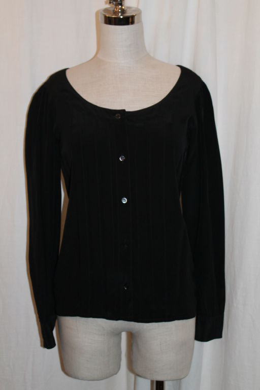 YSL black silk long sleeve pleated button down blouse. Shoulder to shoulder 15.5 inches. Sleeve length is 24 inches.