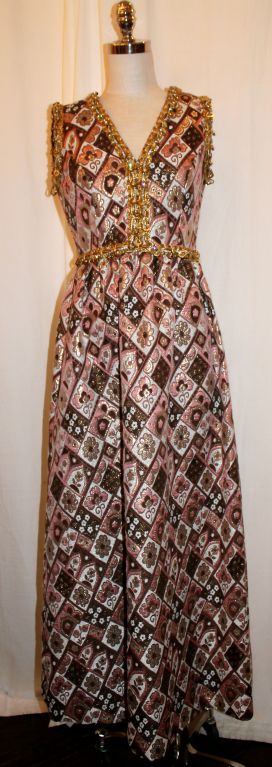 Vintage Oscar de La Renta metallic brocade gown with metallic detail around neckline and waist. - Size 4/6. Circa late 1960's