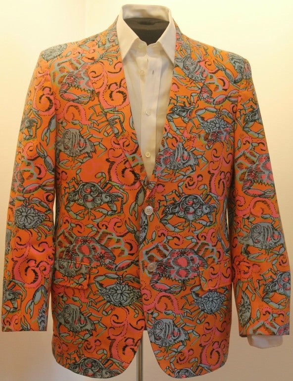 Vintage Lilly Pulitzer Mens Division Orange/Blue/Pink Crabs Print-40. Two button front closure. Two button sleeves. Vent back. Pink liner. Shoulder to shoulder is 18 inches. Sleeve length is 24.