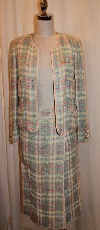 Vintage Chanel Pastel Tweed Skirt Suit.French 36. Measurements are as follows:

Jacket:Shoulder to Shoulder: 15