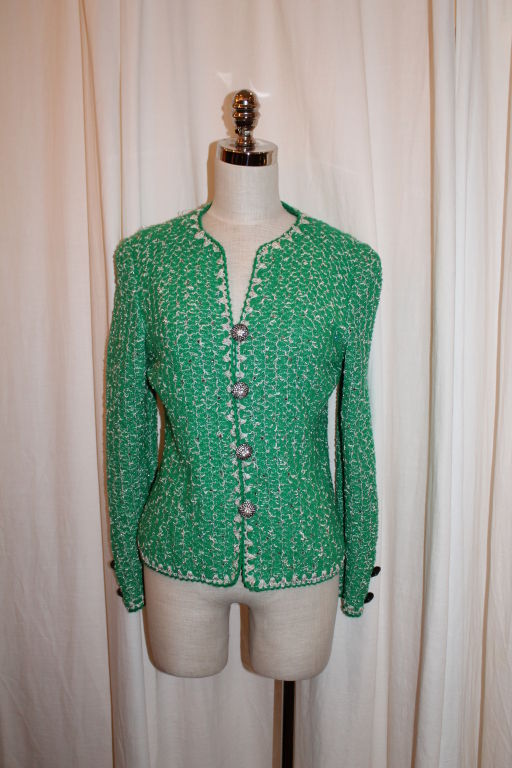 Vintage Emerald Green Wool Knit Adolfo Jacket with white/silver/rhinestone detail throughout Jacket. Circa 80's  This item is in very good pre-owned condition.