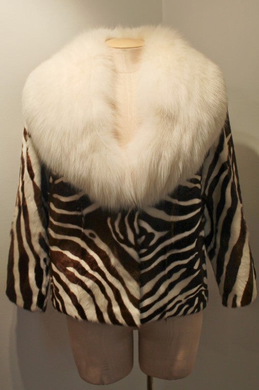 Emanuel Ungaro brown and white zebra dsign, pony hair coat with fox collar. Shoulder to shoulder measurements are 19 inches, sleeve length is 19 inches.