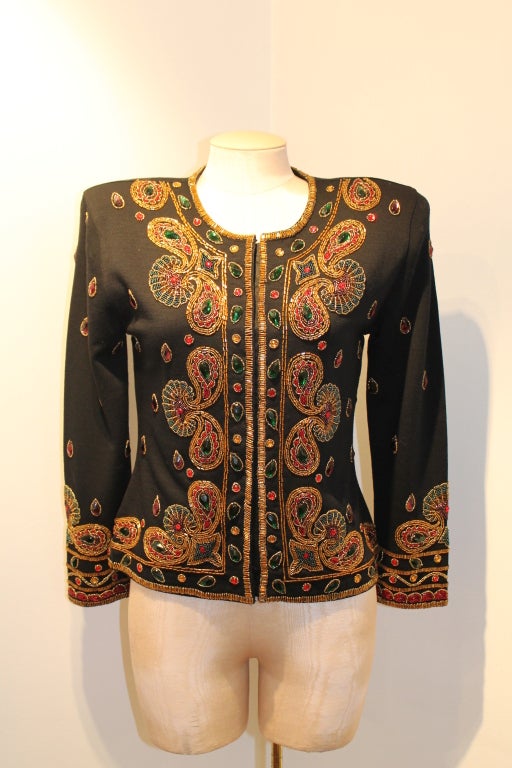Adrienne Vittadini black wool, heavily beaded and jeweled jacket. Shoulder to shoulder measurements are 18 inches. Sleeve length is 23 inches.