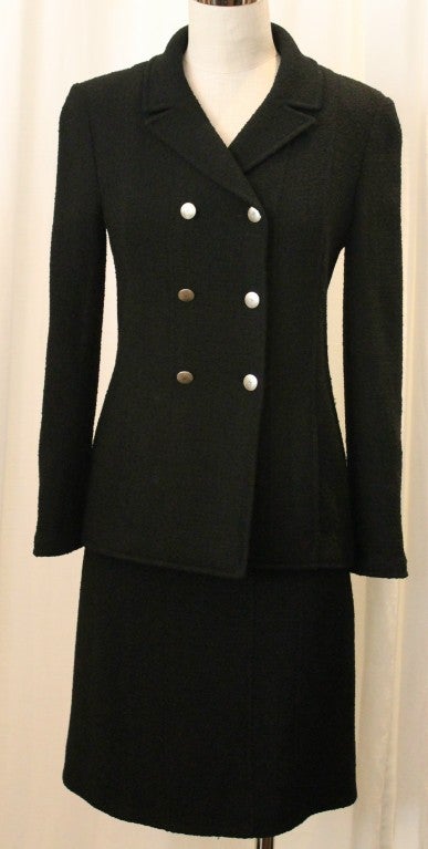 Chanel black tweed skirt suit. Double breasted, silver buttons. Collection 98P.  Extra jacket measurements are, shoulder to shoulder is 15 inches. Length of jacket is 24.5 inches. Skirt meaurements are length is 21.5, waist is 28 inches.