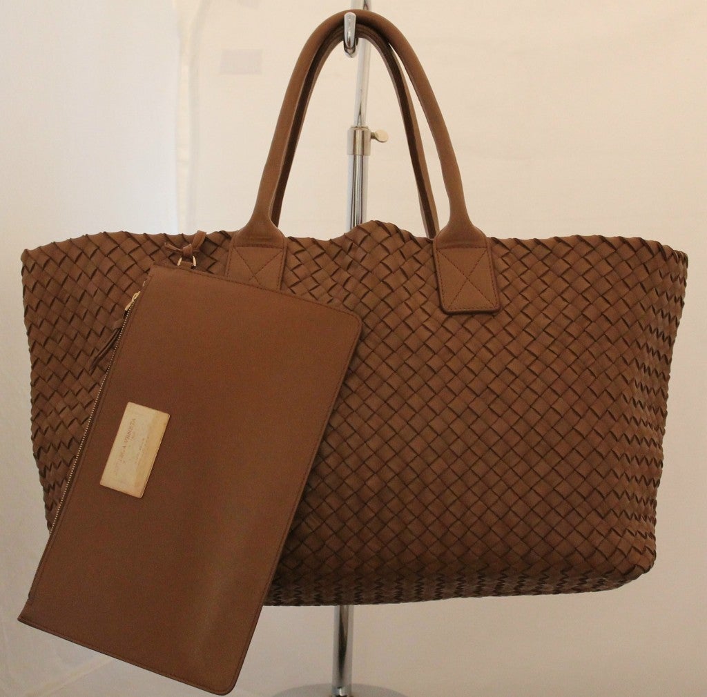 Bottega Veneta large brown woven leather handbag with attached pouch, double handles. Duster included. Drop handle is 7 inches.