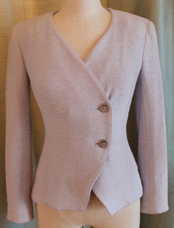 Chanel Lilac cotton jacket with 2 silver buttons, size 34. shoulder to shoulder measures 14.5 inches, sleeve length measures 23 inches. Length of jacket measures 21.5 inches.