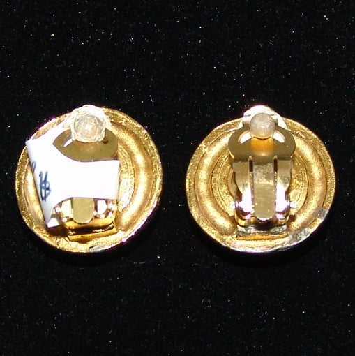 Chanel clip on gold earrings with pearl and rhinestone.  Diameter .75