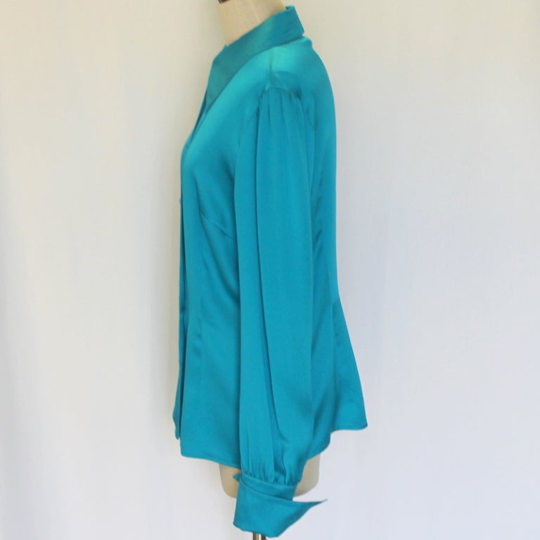 Escada turquoise silk blouse with cuffs, length 25
