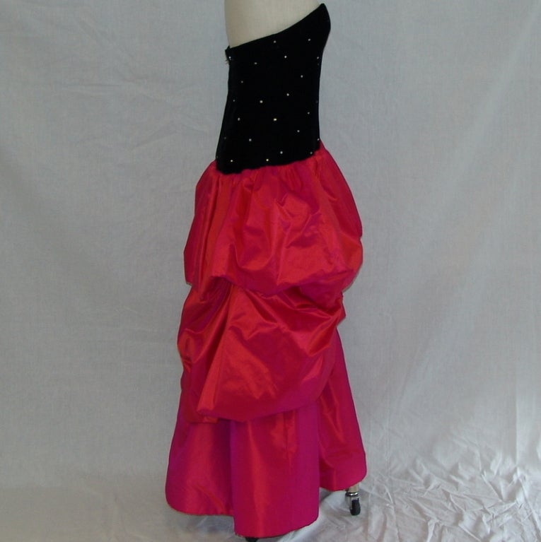Vintage 80"s black velvet top with crystals, and pink taffeta bottom.  Length 46", bust 32", waist 26".  Size 4