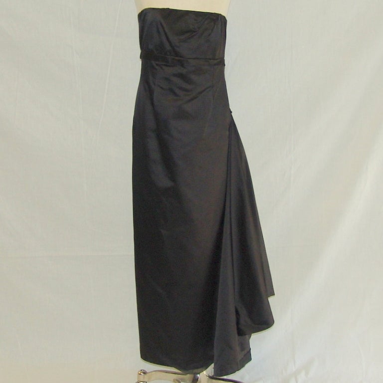 Black silk gown with adjustable train and matching jacket.  Length in front 49