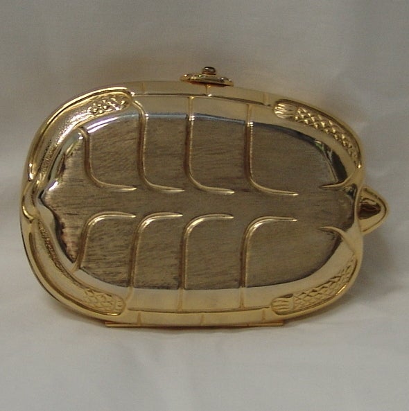 Judith Leiber Turtle Minaudiere - Goldtone w/ rhinestones. Can be worn as a clutch or as a shoulder bag as it has a chain strap as well. This bag is in excellent vintage condition, with only a few spots where the stone is missing. Not visible to the