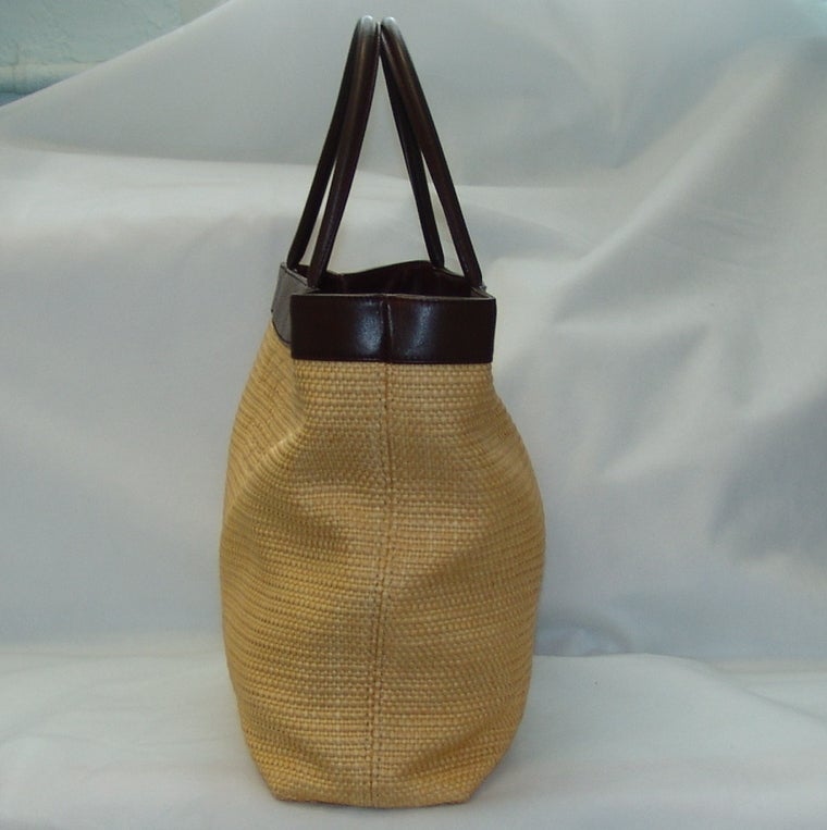 Chanel Tote Handbag made of straw and brown leather. Height 12