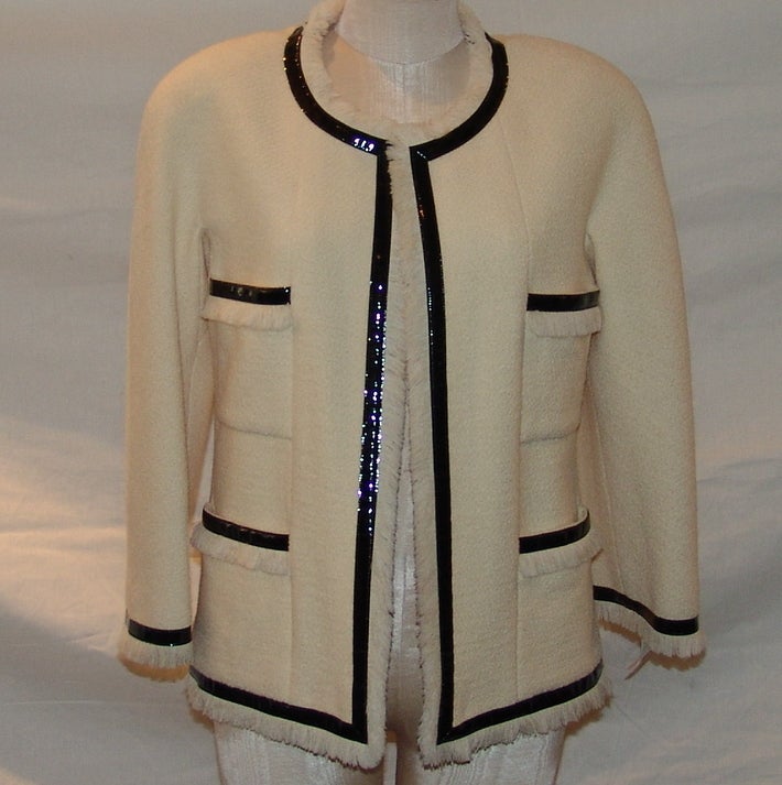Chanel ivory wool jacket with black patent leather trim, length 25
