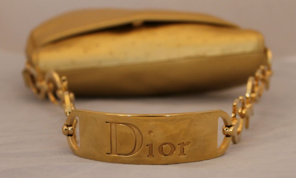Women's Christian Dior Gold Embossed Leather Saddle Bag