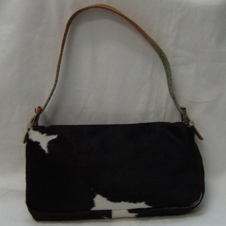 Fendi black and brown pony hair handbag.  Handle and front flap are snake skin.  Height 5