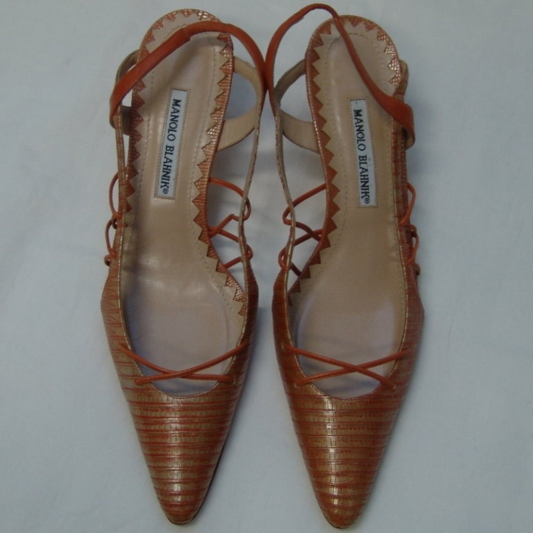 Manolo Blahnik tangerine colored lizard skin shoes, heel 2