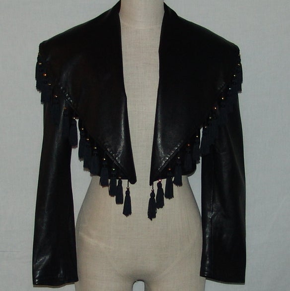 Vintage Versace black leather jacket.  Length 15