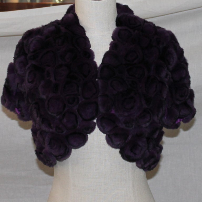 Bolero with purple fur in shape of roses.  Length 16