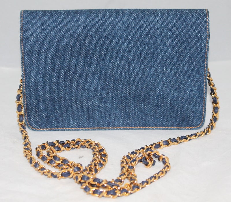 Chanel Denim Wallet on a Chain Limited edition Crossbody Handbag - GHW Circa 1996  This limited edition wallet on a chain denim bag is in excellent condition. Comes with authenticity card.
Measurements:
Length 7.5