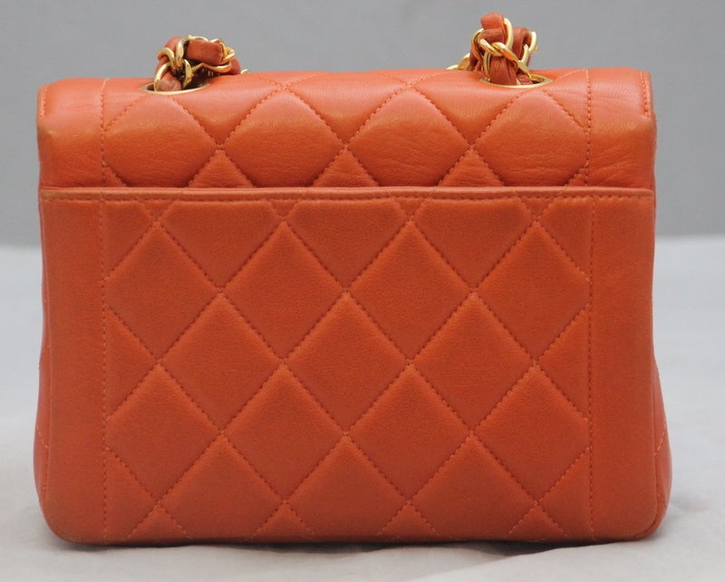 Chanel Orange Lambskin Mini Flap Handbag - GHW Circa 1996 In Good Condition In West Palm Beach, FL