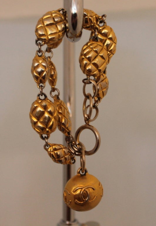 Chanel Vintage Gold Quilted Bracelet with hanging gold 