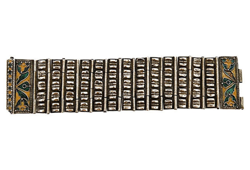 Chinese silver hinged cuff bracelet with enameled closure. Unsigned.
N.P. Trent has been a respected name in antiques for over 30 years with a large collection of antique and vintage jewelry.