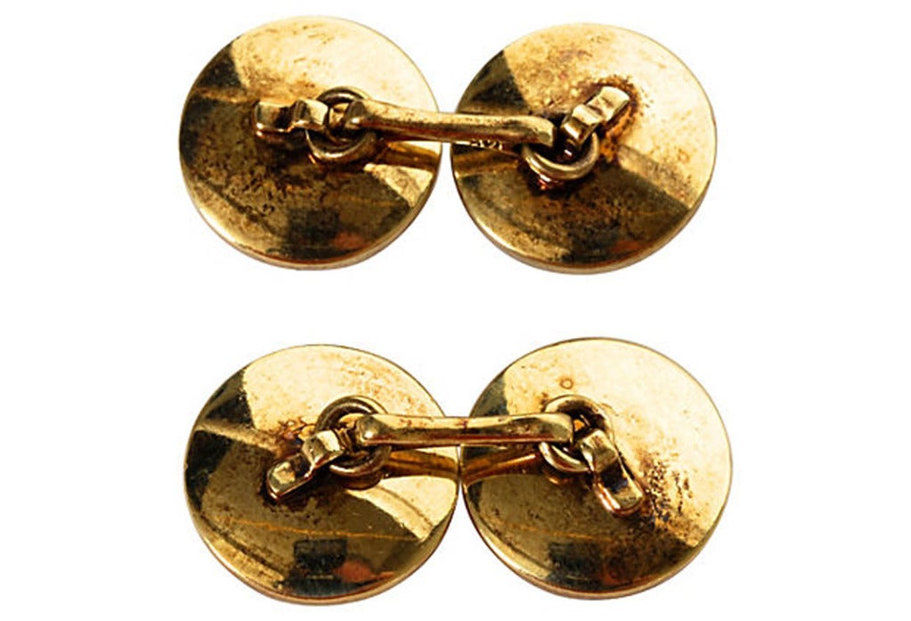 A beautiful pair of 14K yellow gold and reverse painted Essex Crystal nautical flag cufflinks. Essex crystal is a process where rock crystals are cut as a cabochon and carved on the flat side, then painted on the back to produce a three-dimensional