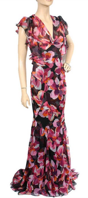 GUCCI DRESS 

Luxious printed chiffon-silk, exquisite design, and unique cut create a heavenly dress.
 
A tie draws attention to the open back, but you can also tie it in a front – however, we can guarantee that won’t be the only part of you