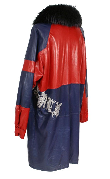 GIANNI VERSACE LEATHER COAT

DESIGNED BY GIANNI HIMSELF

EXTREMELY RARE AND HIGHLY COLLECTIBLE

Fall/Winter 1996

Blue and red leather with fox fur and Swarovski crystals. Fully lined with red Medusa signature lining.
Finished with a removable fox