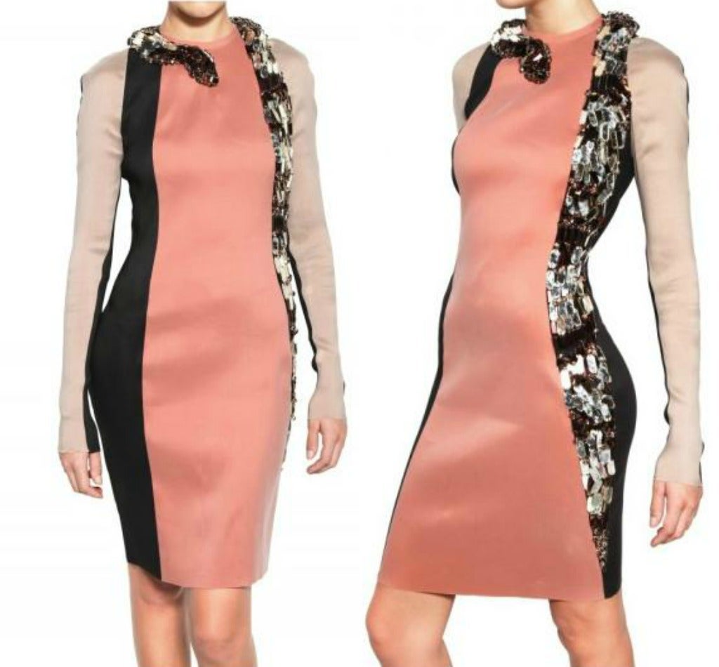 BRAND NEW LANVIN DRESS

Copper and black color-block dress with one out-of-the-ordinary addition - a Swarovski crystal snake wrapped around the neck 
and winded down the left side of the body. It is not often we see reptile replicas incorporated