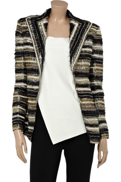 BRAND NEW BALMAIN JACKET

Balmain take a decadent glam-rock route with this diamanté-encrusted jacket. Team this frayed metallic piece with a draped jersey top and skinny pants for rock-cool appeal. Over $30,000 new!

Loved by many