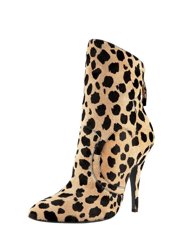 Pristine Balmain Leopard-Print Ankle Boot Tan/black leopard-printed, dyed hair calf (Italy) sections. Topstitching traces curvily pieced design. Almond toe. Slope-top shaft. Back zip. 4 1/2