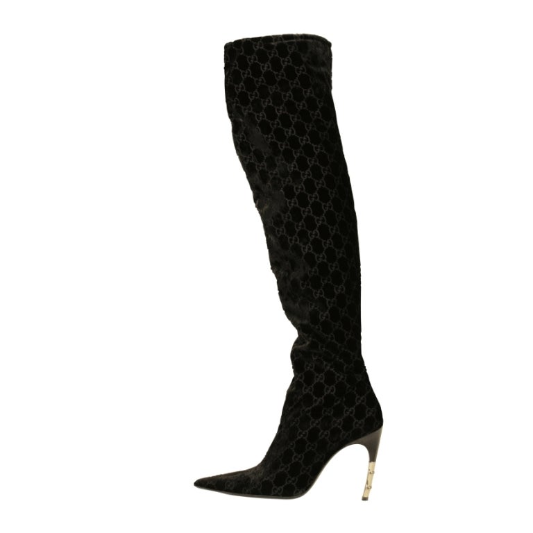 TOM FORD for GUCCI BLACK VELVET OVER THE KNEE BOOTS

Iconic boots that will never go out of style! Impossible to find! Black GG print velvet is finished with snakeskin and bamboo heel.

Size 40 C

Condition: Excellent, New!