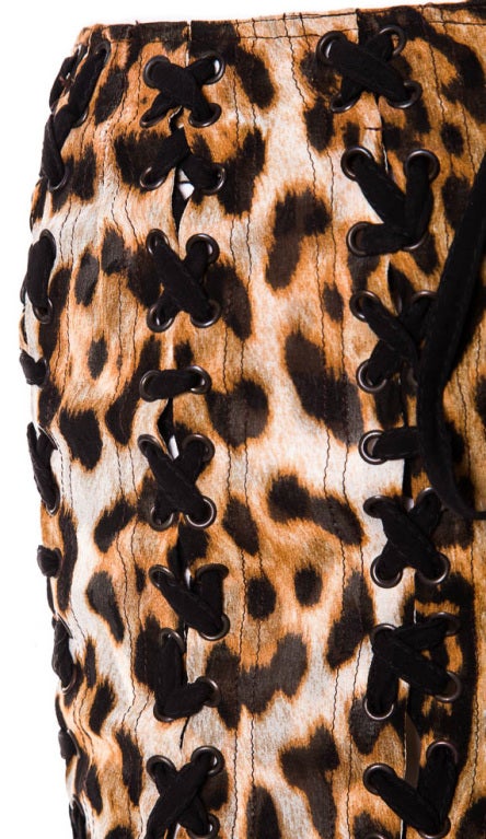 S/S 2002 Tom Ford for Yves Saint Laurent Safari Skirt

Black, brown and white skirt with leopard print pattern throughout,
lace up detail throughout and back slit. Chiffon silk.

Size not listed, approximately US 4

Condition: