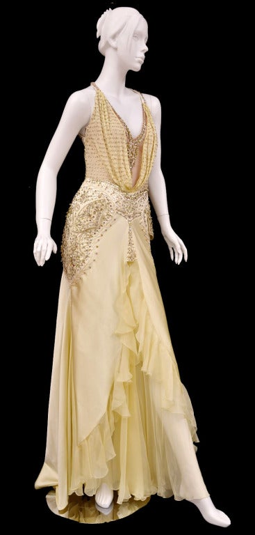 Unique VERSACE crystal-embellished silk gown.
Truly one-of-the-kind! The gown was custom made for Hollywood's A-list star (due to privacy we cannot reveal the name )

Versace's silk gown is intricately hand-embroidered with  crystals, studs and