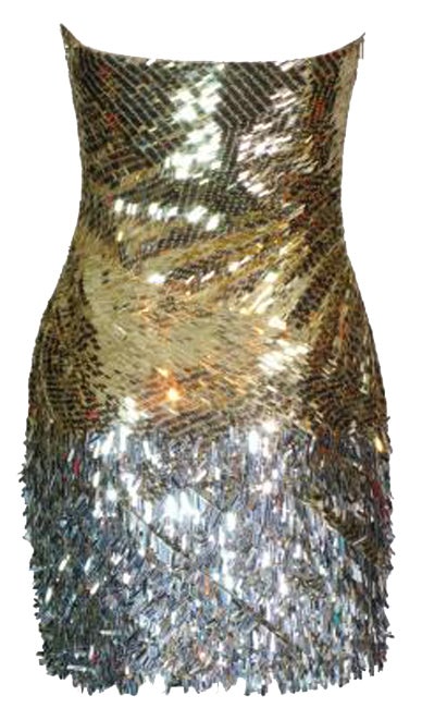 VERSACE sequin and paillette embellished dress.

Gwyneth Paltrow shined in the same gorgeous minidress at the Grammy Awards 

and countless other celebrities wore it for magazine covers.

Lined in nude mesh 
Size 42

length is about 26