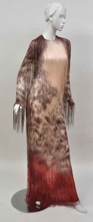 TOM FORD 
   
FLESH COLORED SILK GEORGETTE HAND EMBROIDERED AND HAND PAINTED FRINGED EVENING COLUMN DRESS

Size: 40 - US 4

Retail price  $22,900.00 USD  ( 14,950 GBP)

The gown is featured in SCAD Museum of Art! 
 
Brand new, with tags!