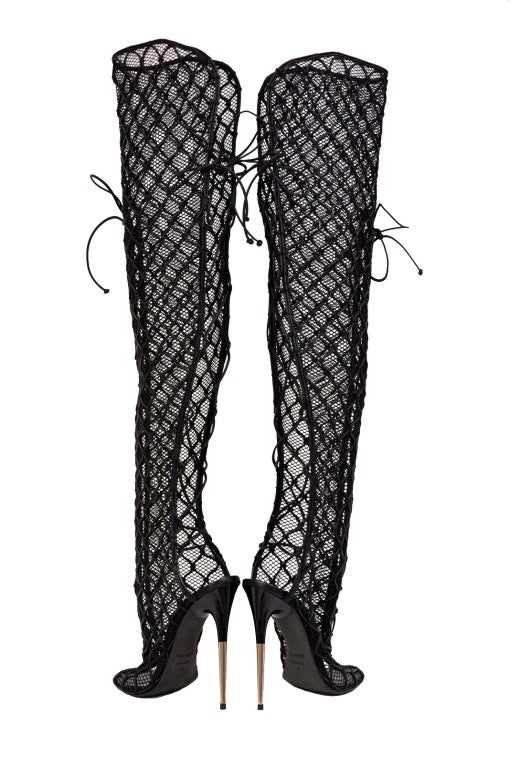 fishnet thigh high boots