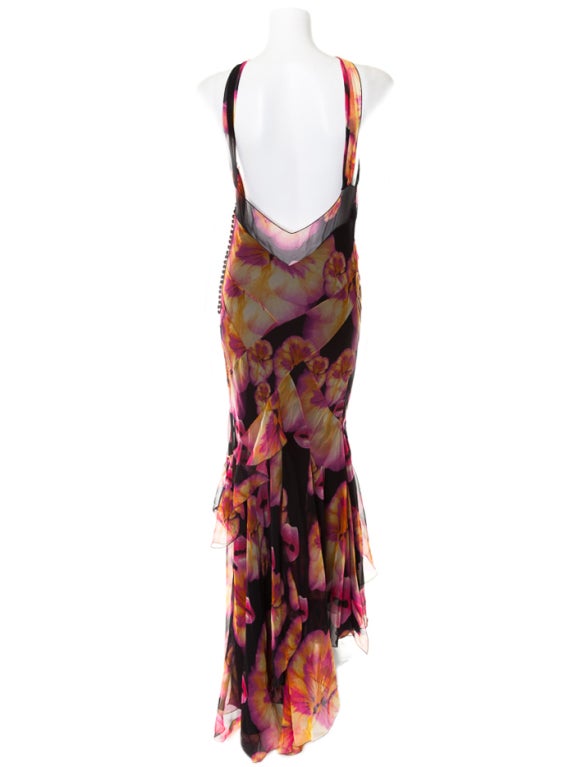Beautifully printed with lips and flowers, Christian Dior s chiffon gown is a true collector's piece.

Size 42 - US 10

100% Silk

Fully lined