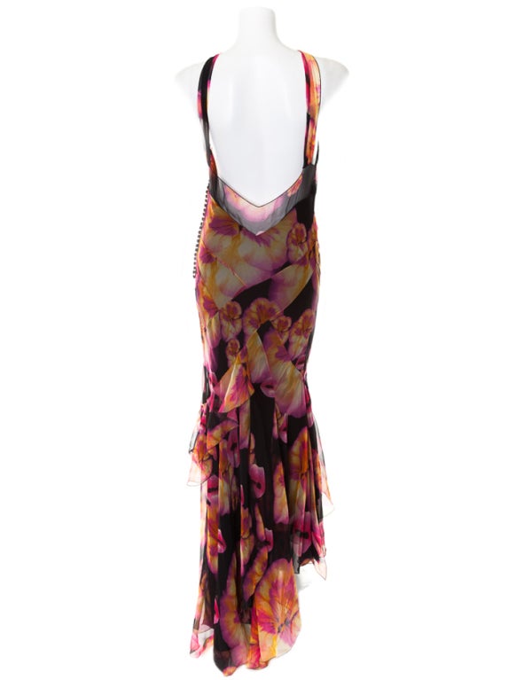 Bellamente estampado con labios y flores, el vestido de gasa de Christian Dior es una auténtica pieza de coleccionista.

Talla 42 - US 10

100% Seda

Totalmente forrado