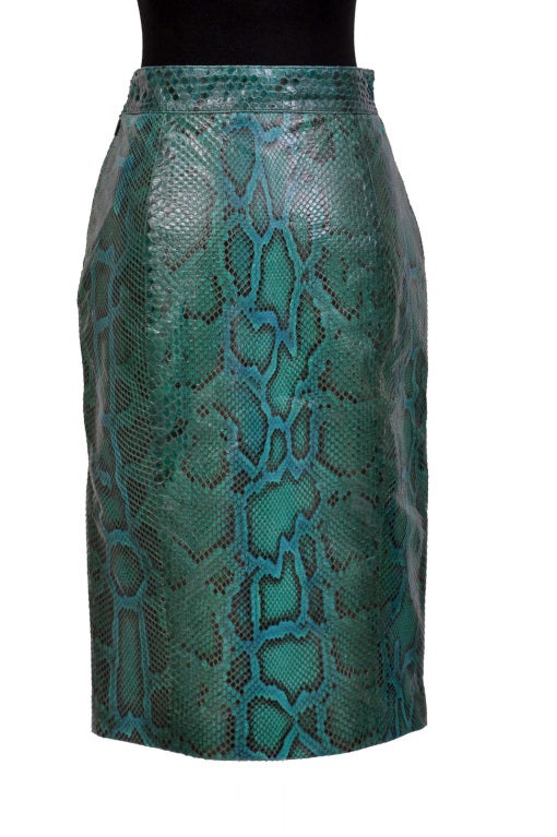 Expertly crafted from genuine snakeskin, Guccis pencil skirt will lend an exotic accent to everyday outfits.

Size 42 - US 8

Retail price is $4,200

Brand new, with tags.

Wear it with Gucci fox fur scarf (listed separately in our store)