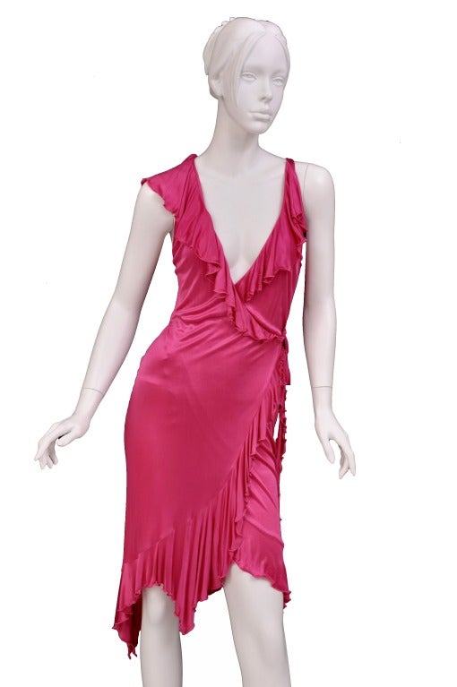 BRAND NEW VERSACE DRESS

MADONNA WORE THE SAME DRESS FOR THE GRAMMY'S

Introduce bold brights into your cocktail wardrobe with Versace's hot pink stretch wrap dress. Embrace your glamour by wearing this strapless power piece with high-shine