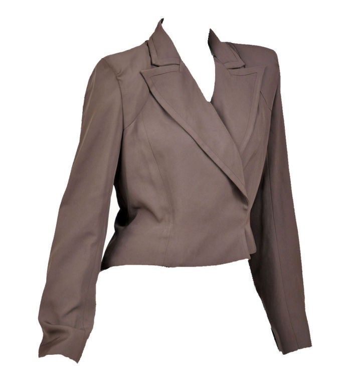 Highly collectible YSL jacket designed by Tom Ford!

Stretch-faille, gathered-at-the-shoulder jacket has opened 2003 Spring/Summer Collection and was featured on YSL ad.

FR Size 42 - US 10

Excellent condition