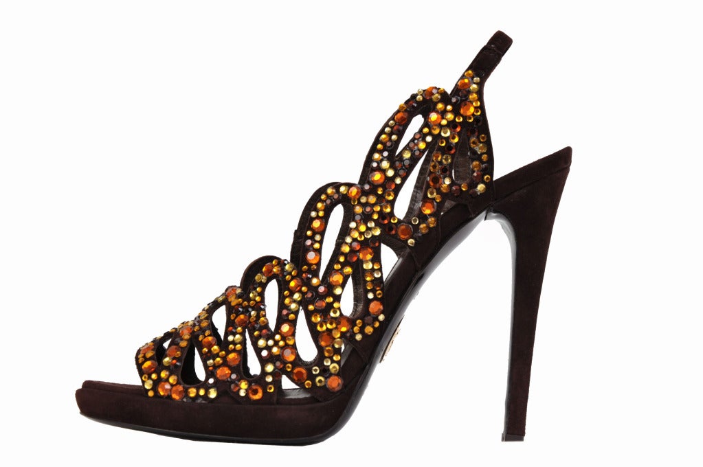 ROBERTO CAVALLI BROWN SUEDE PLATFORM SHOES WITH SWAROVSKI CRYSTALS

Sizes: 38 and 38.5

Brand New