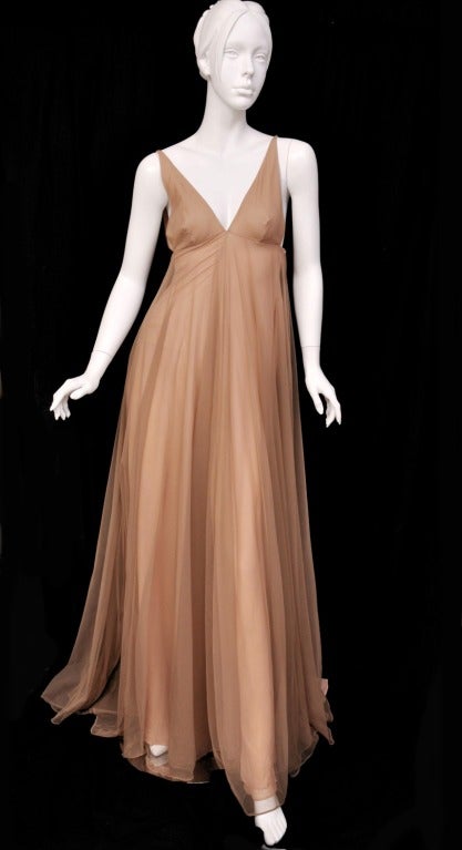 Iconic F/W 1998 Tom Ford for Gucci Fairy Tale
Dress
A classic evening choice that will never let you
down, this Gucci dress by Tom Ford is a wardrobe
staple. A romantic choice engineered in Italy with
dreamy, nude tulle for ladylike elegance.
First